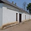 The Crafts House of the Krāslava Castle Complex before restoration with mold on the building decoration