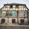 Jelgava's Old Town block building with beautiful plasterwork instead of windows