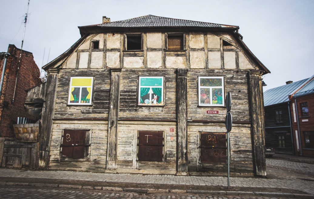 Jelgava's Old Town block building with beautiful plasterwork instead of windows