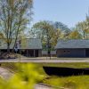 Carnikava Local History Centre in landscape