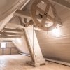 The attic of Mrs. Hoyer’s Hotel in Liepāja with a wheelbarrow visible