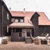 The courtyard of Mrs. Hoyer's guest house with stairs and the entrance door to the guest house