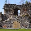 The ruins of the Northern Tower of Ērģeme Medieval Castle with an attached door