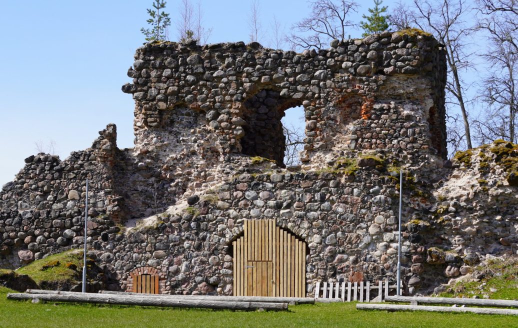The ruins of the Northern Tower of Ērģeme Medieval Castle with an attached door