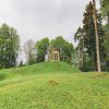 Pavilion - rotunda in Tempļakalnas park in Alūksne, trees and grass in the landscape in summer