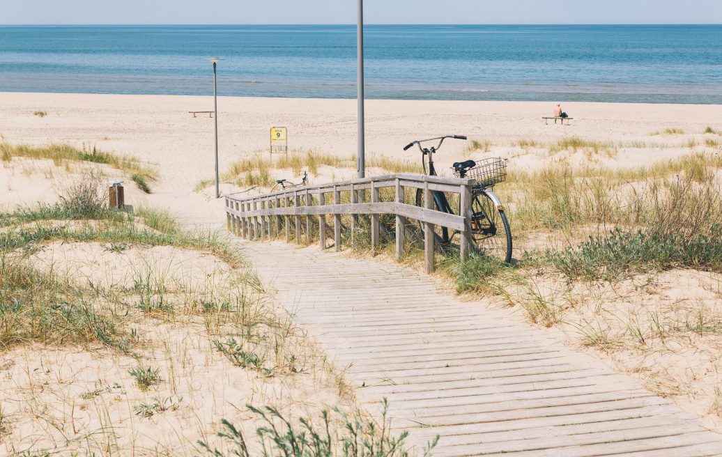 A gray dune in the south-western district of Ventspils with a built pedestrian path