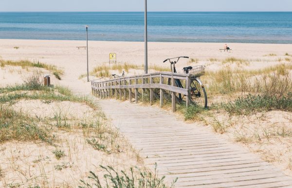 A gray dune in the south-western district of Ventspils with a built pedestrian path