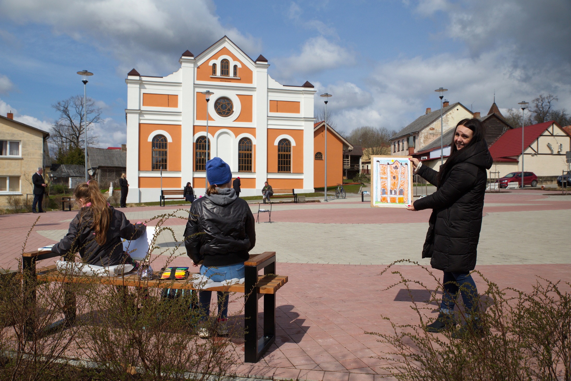 A visitor to the Sabile Makslas Culture and Tourism Center demonstrates artwork