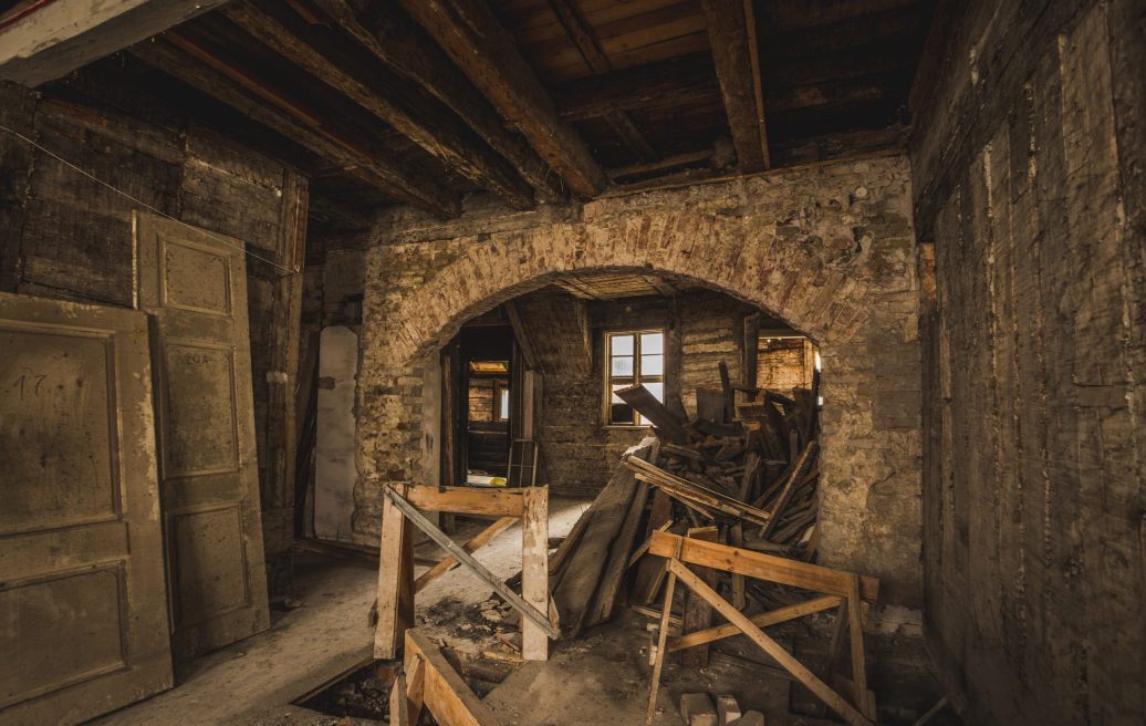 The interior of Mrs. Hoyer's guest house before the restoration, the boards are assembled