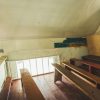 The room in the Jūrkalne Roman Catholic Church before renovation