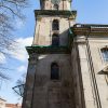 The tower of Liepāja's Holy Trinity Cathedral before restoration with blue sky in the background