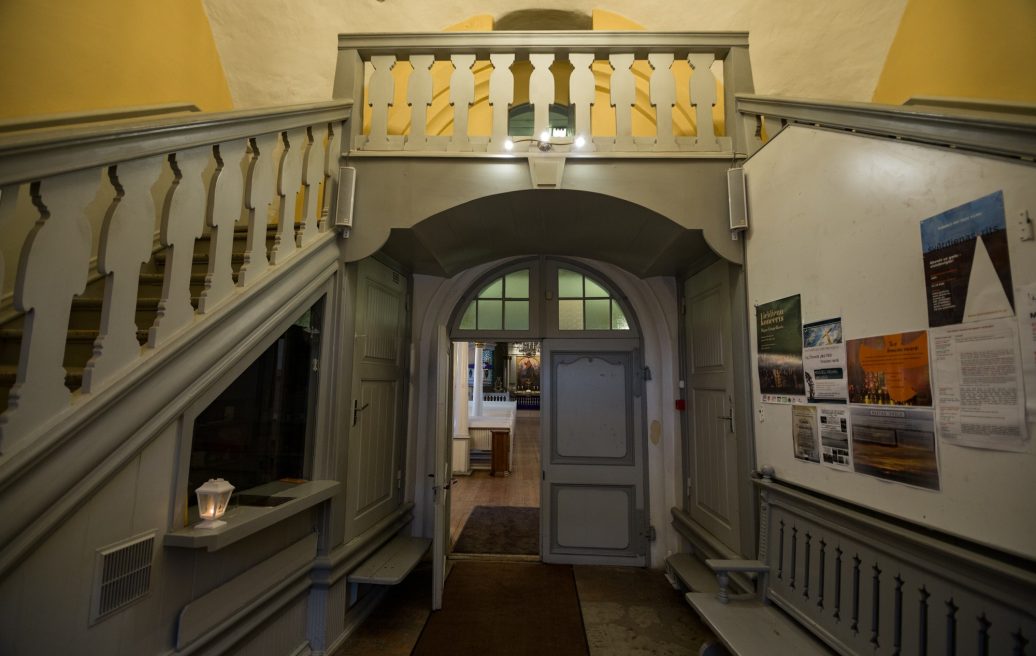 St. Valmiera Simon's Church-entrance door, stairs and news stand