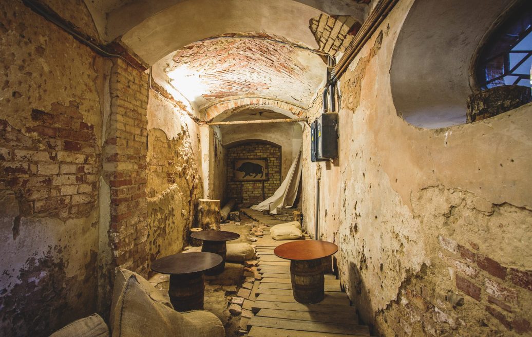 Hallway of Dundaga Castle before renovation with wall plaster debris