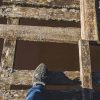 The Irbe Footbridge with a human leg and a missing wooden plank