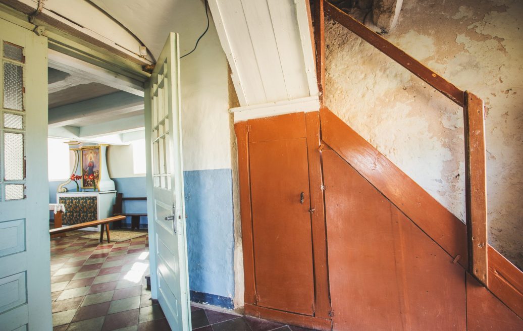 The door of Jūrkalne Roman Catholic Church, which leads to the staircase