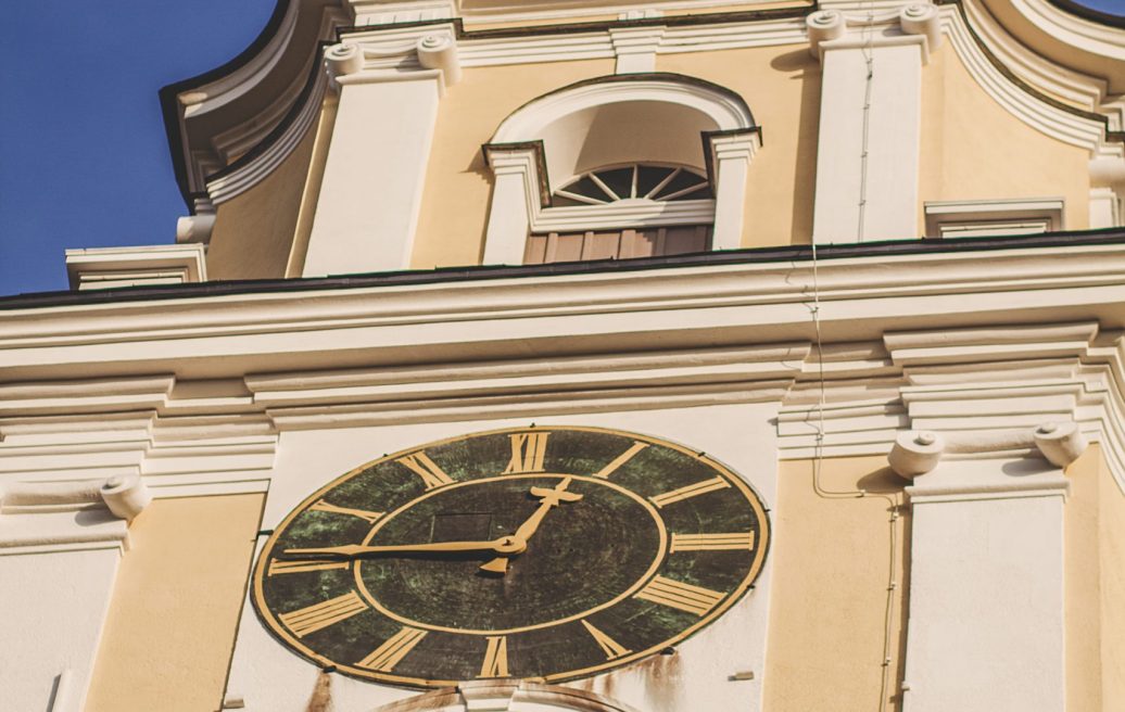 Liepāja Holy Trinity Cathedral clock on the tower in the foreground