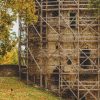 Part of the medieval castle of Cēsis with wooden security racks