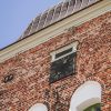 St. Valmiera Simon's Church close up with the church's facade clock