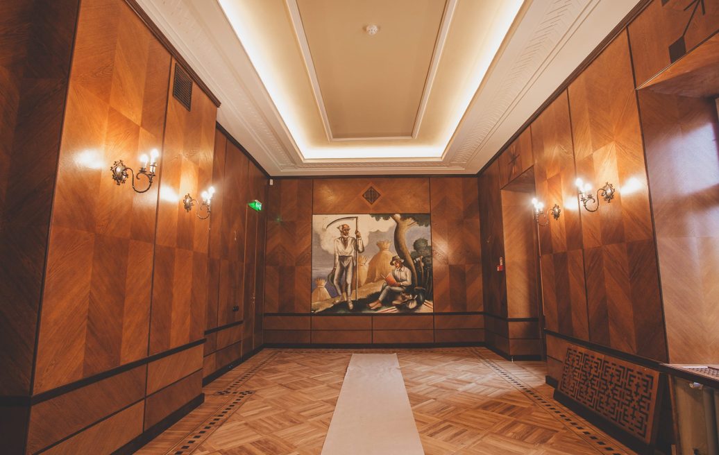 The restored corridor of Sigulda's New Castle with a painting