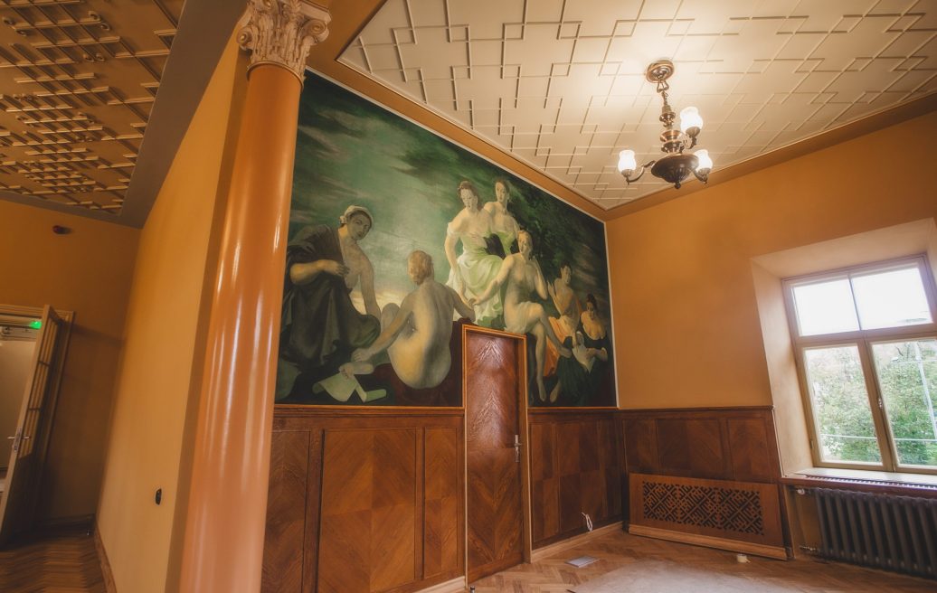 Sigulda New Castle artwork with 7 women in a renovated room