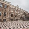 The design of the Sigulda New Castle building after reconstruction. Side view, visible building and stairs.