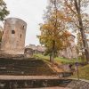 Cēsis medieval castle tower without a roof and stairs leading closer to the tower