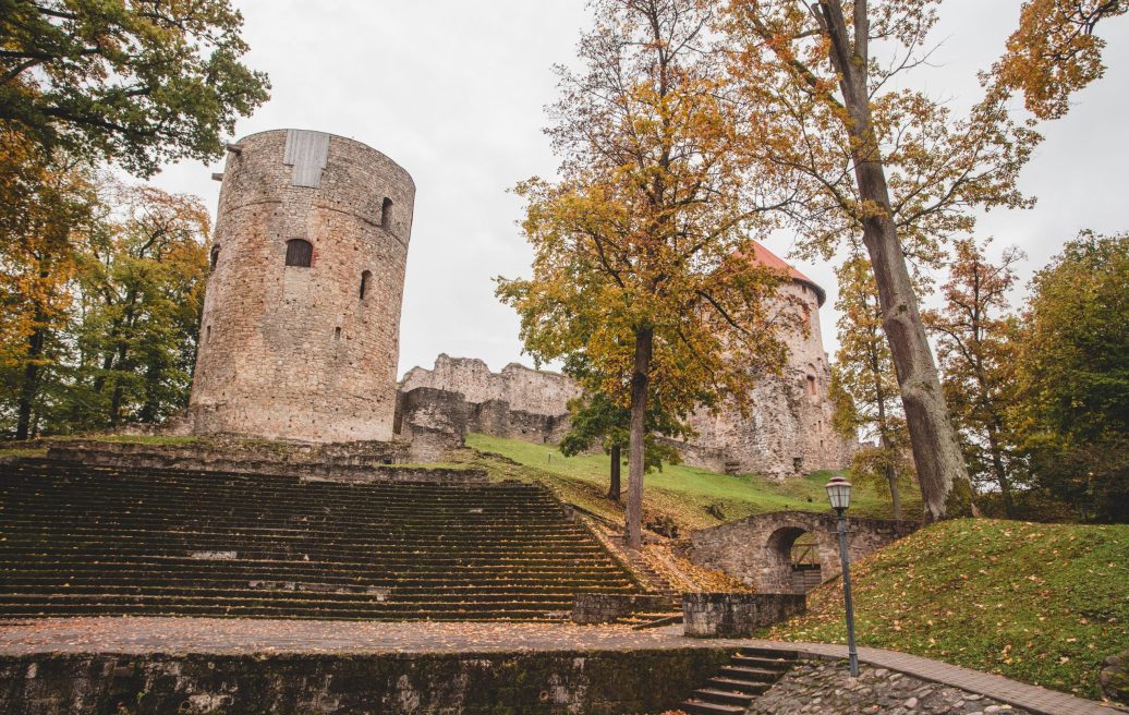 Cēsis medieval castle tower without a roof and stairs leading closer to the tower