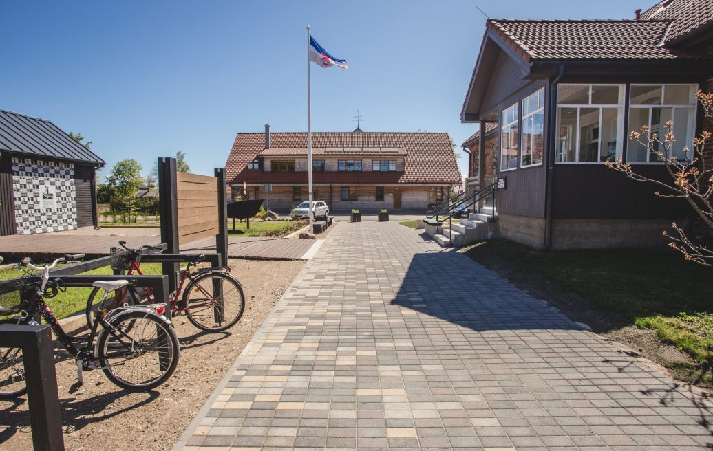 The main embankment of the anti-flood promenade of Pavilosta and the parking place for bicycles