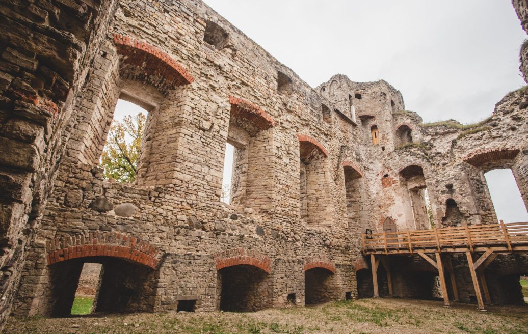 The courtyard of the medieval castle of Cēsis, where you can see an object of interest