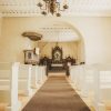 The altar of the Rubene Evangelical Lutheran Church with a painting of Jesus Christ