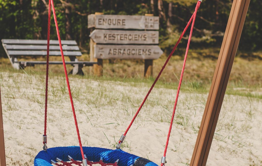 Engure Beach Park swings in the sand in the recreation area