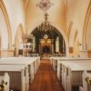 St. Valmiera Simon's Church from the inside, chandelier, altar, seats