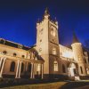 Beautifully illuminated Stamerien Castle in the darkness of the day