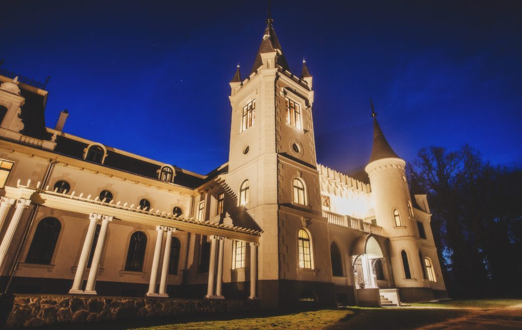 Beautifully illuminated Stamerien Castle in the darkness of the day