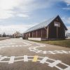 Painting of train tracks outside the Alūksne Station Barn