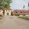 The Šlokenbeka Manor Ensemble with Flags