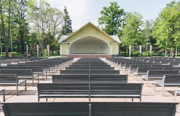 Mellužu estrāde with seats for visitors and a stage
