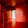 The bright red stairwell of the Vizium Science Center