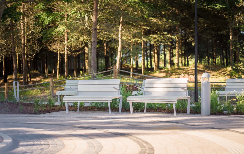 The beach benches of the historical center of Liepāja by the forest