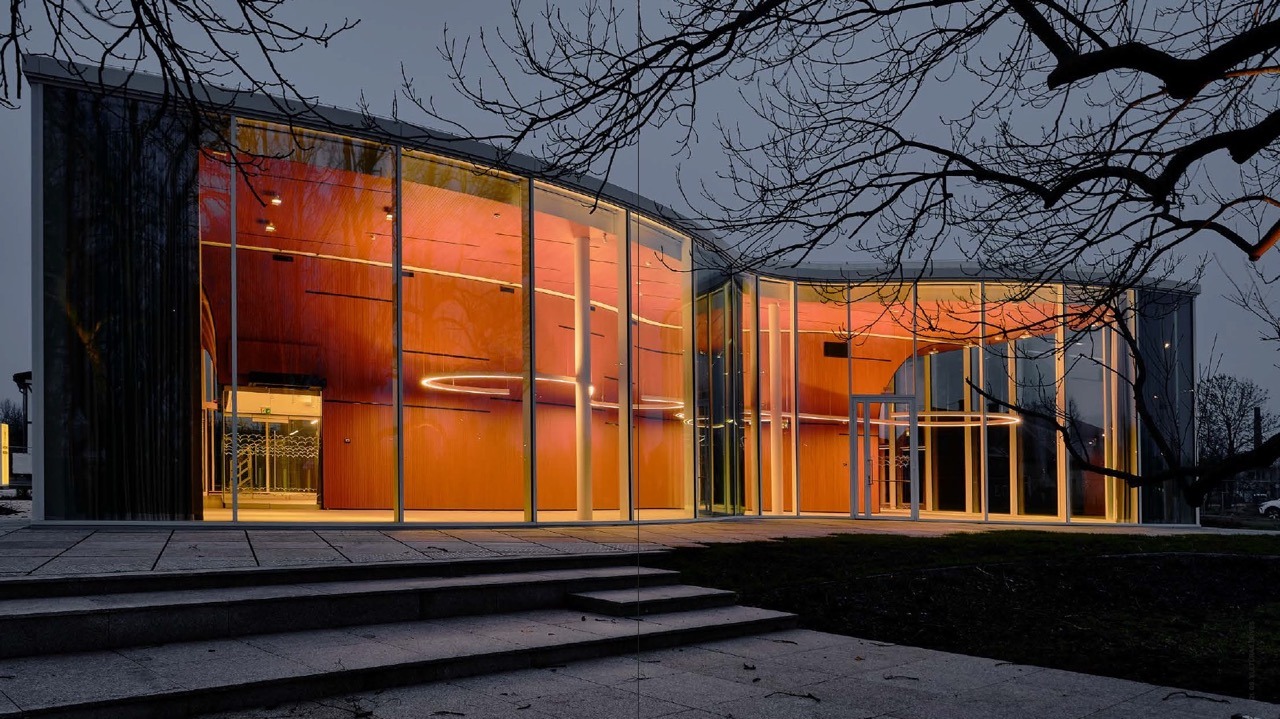 The illuminated building of Galiņciems Library